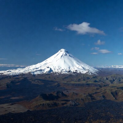 Snow-Capped Volcanic Peak Aerial View