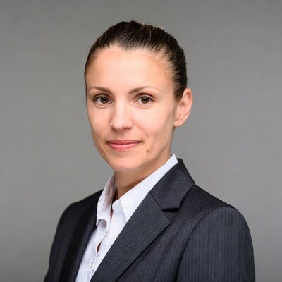 Professional woman in suit smiling