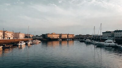 Sunset Marina with Yachts and Buildings