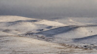 Snowy Rolling Hills Landscape