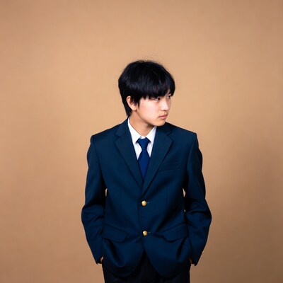 Asian boy in navy school uniform