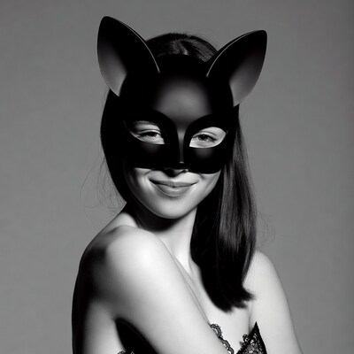 Woman in black cat mask