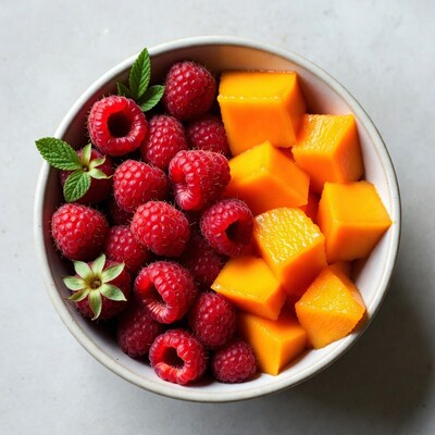 Raspberries and Mango in Bowl