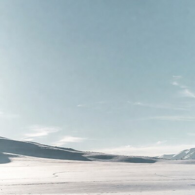 Snowy Mountains Under Blue Sky