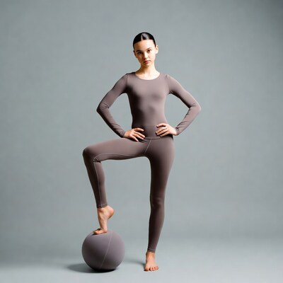Girl balancing on exercise ball