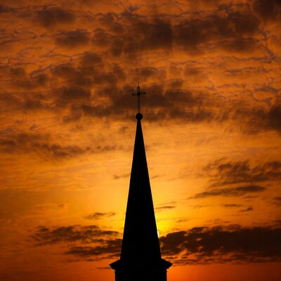 Church Steeple Silhouette at Sunset