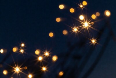 Golden Bokeh Lights on Dark Background