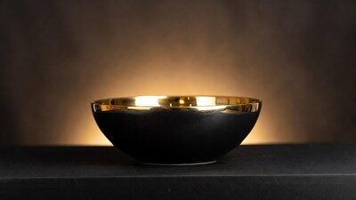 Black bowl with gold rim