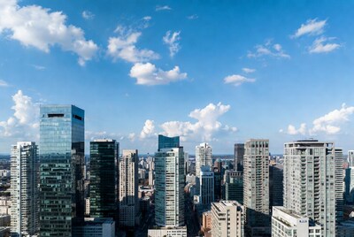 Aerial View of Modern Skyscrapers Under Blue Sky