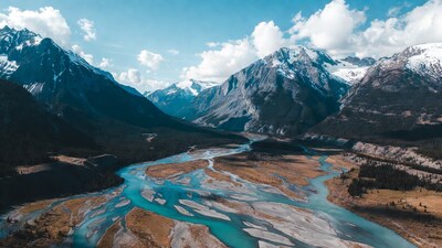 Turquoise River in Snowy Mountains
