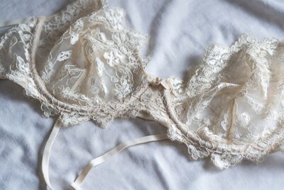 White Lace Bra on Bed
