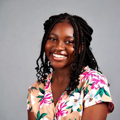 Smiling African-American girl in floral dress