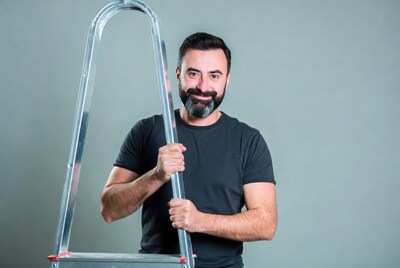 Man holding ladder