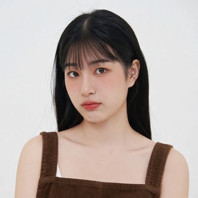 Asian woman in brown corduroy dress