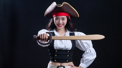 Asian woman in pirate costume with sword