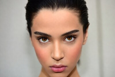 Closeup portrait of woman with brown eyes