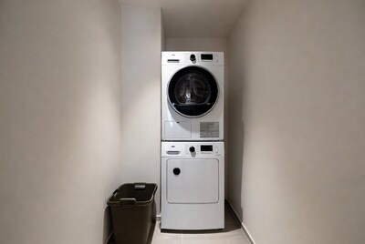 White Stacked Washer Dryer Laundry Room