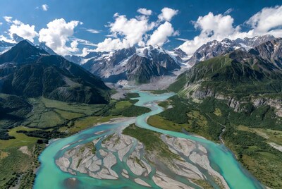 Turquoise River in Snowy Mountains