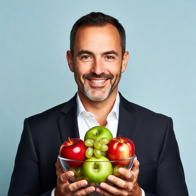 Man holding fruit bowl