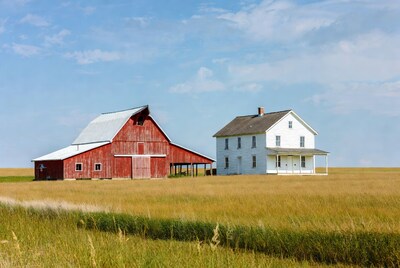 Red Barn and White Farmhouse in Field
