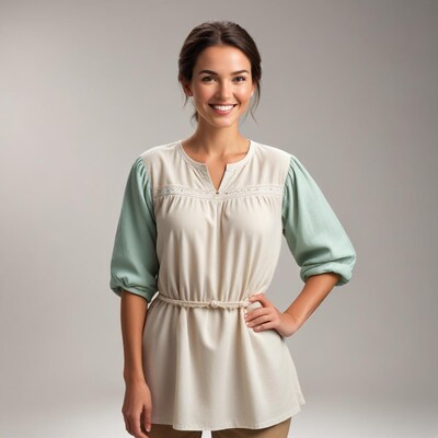 Smiling woman in cream green dress
