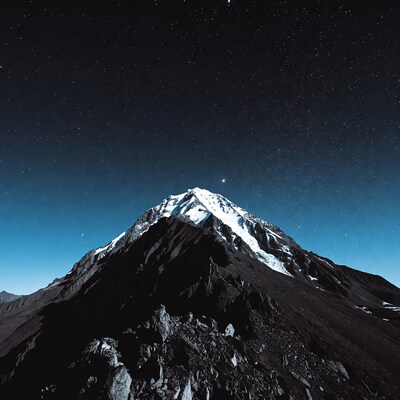 Snowy Mountain Under Starry Night Sky