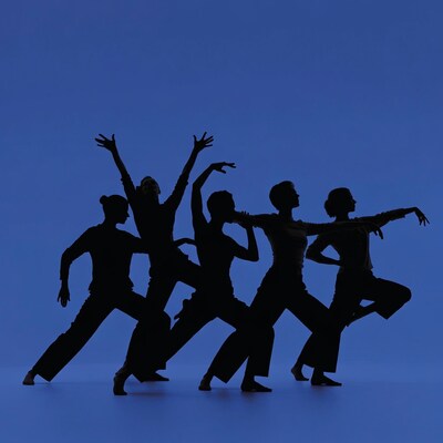 Dancers Silhouettes on Blue Background