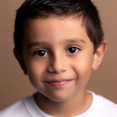 Smiling Latino boy close-up portrait