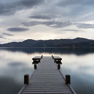 Wooden pier over calm lake