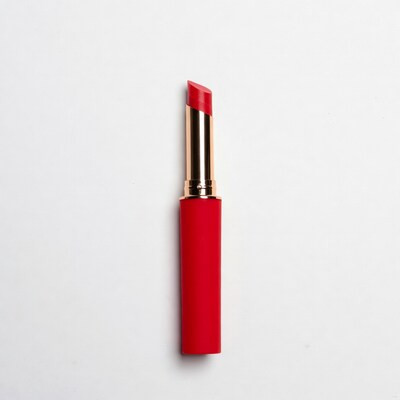 Red lipstick on white background