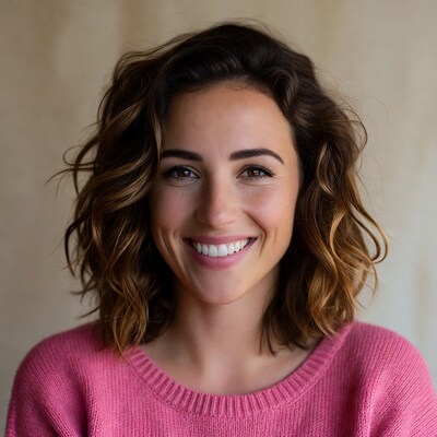Smiling woman in pink sweater