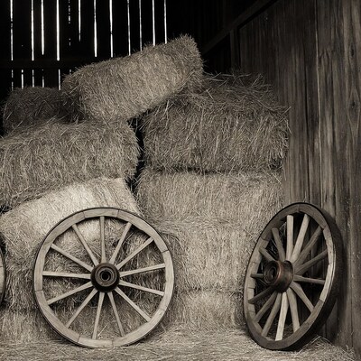 Hay Bales and Wagon Wheels in Barn