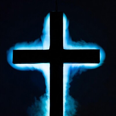 Glowing Blue Cross on Black Background