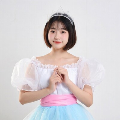 Asian girl in princess dress with tiara