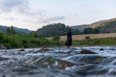 Man fly fishing in river