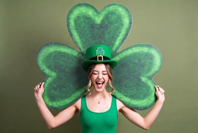 Woman with shamrock wings and leprechaun hat