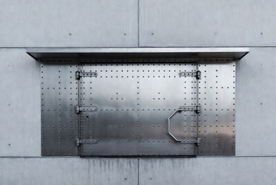 Metal Door on Concrete Wall