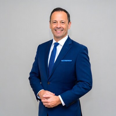 Smiling man in blue suit
