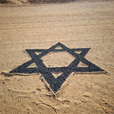 Star of David in sand