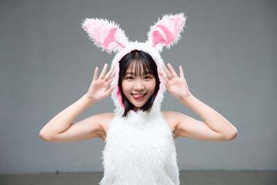 Asian girl in pink bunny costume