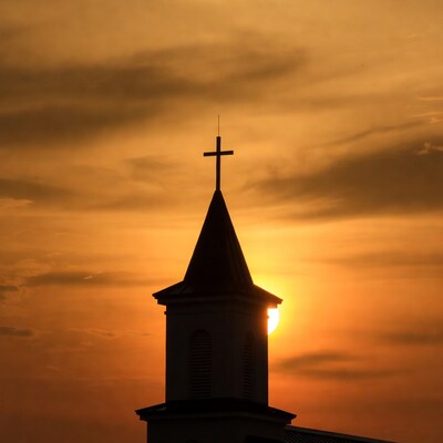Church Steeple Silhouette at Sunset