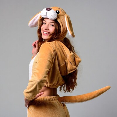 Asian woman in brown dog onesie