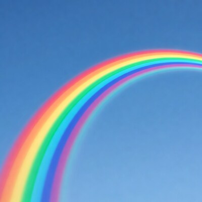 Vibrant Rainbow in Blue Sky