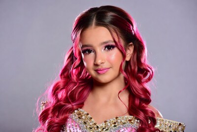 Girl with pink hair in sparkly dress