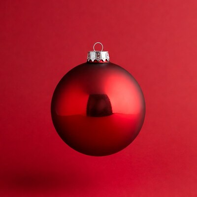 Red Christmas Ornament on Red Background