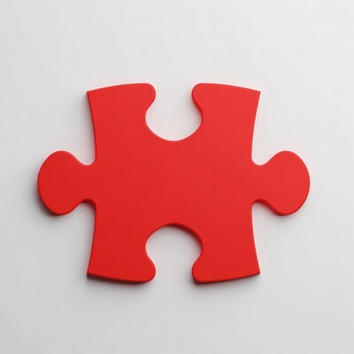 Red puzzle piece on white background