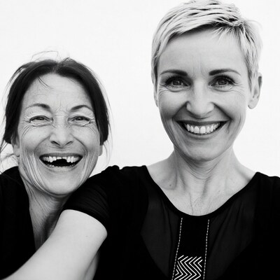 Two Smiling Women Embracing Close-up