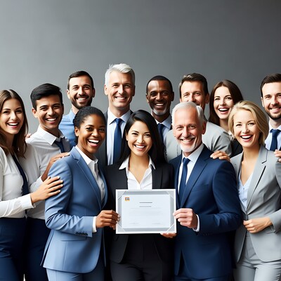 Diverse team holding award certificate