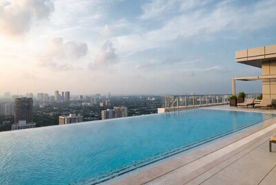 Infinity Pool Over City Skyline