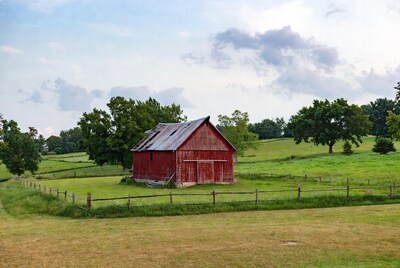Red Barn in Green Pasture Field